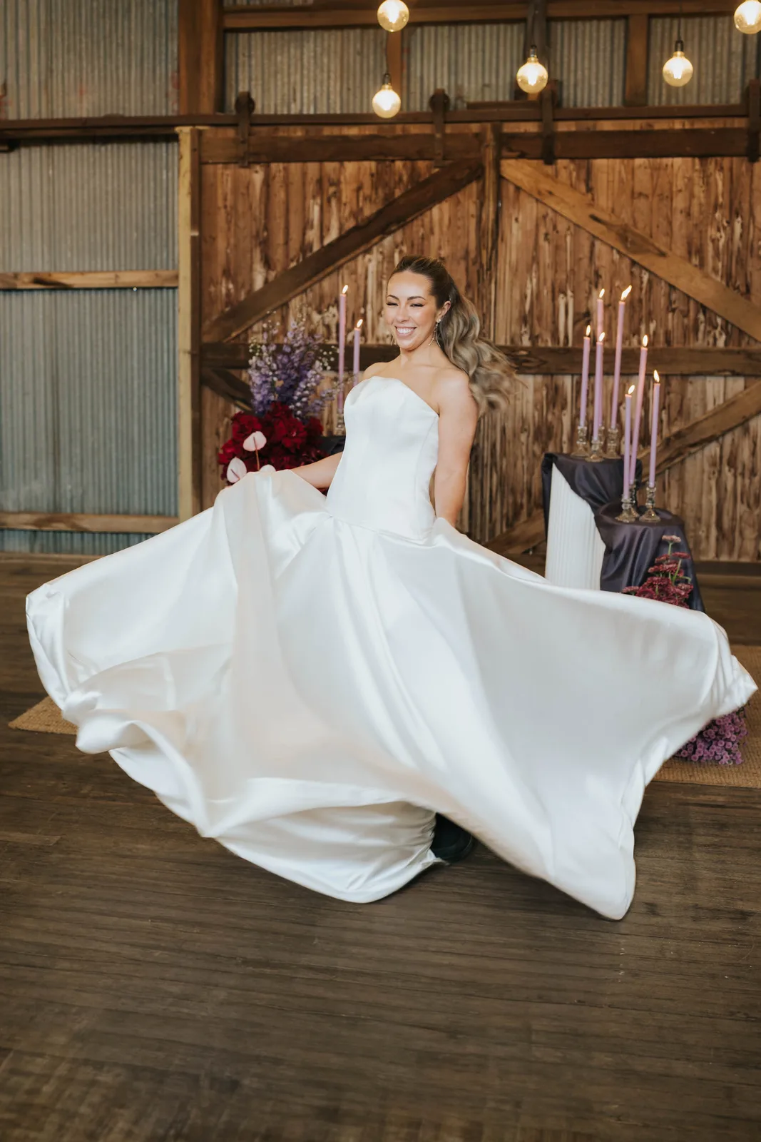 Bride twirling gown in rustic barn wedding venue – Japanese documentary wedding photographer Sydney