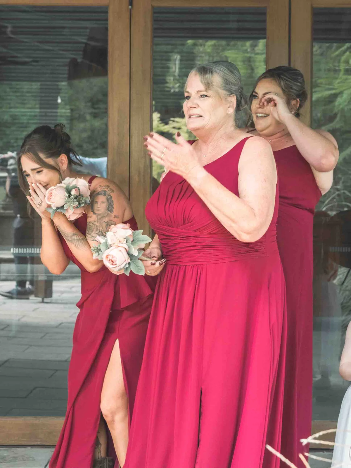 Bridesmaids emotional during ceremony in red dresses, Loxley on Bellbird Hill – Japanese documentary wedding photographer Sydney