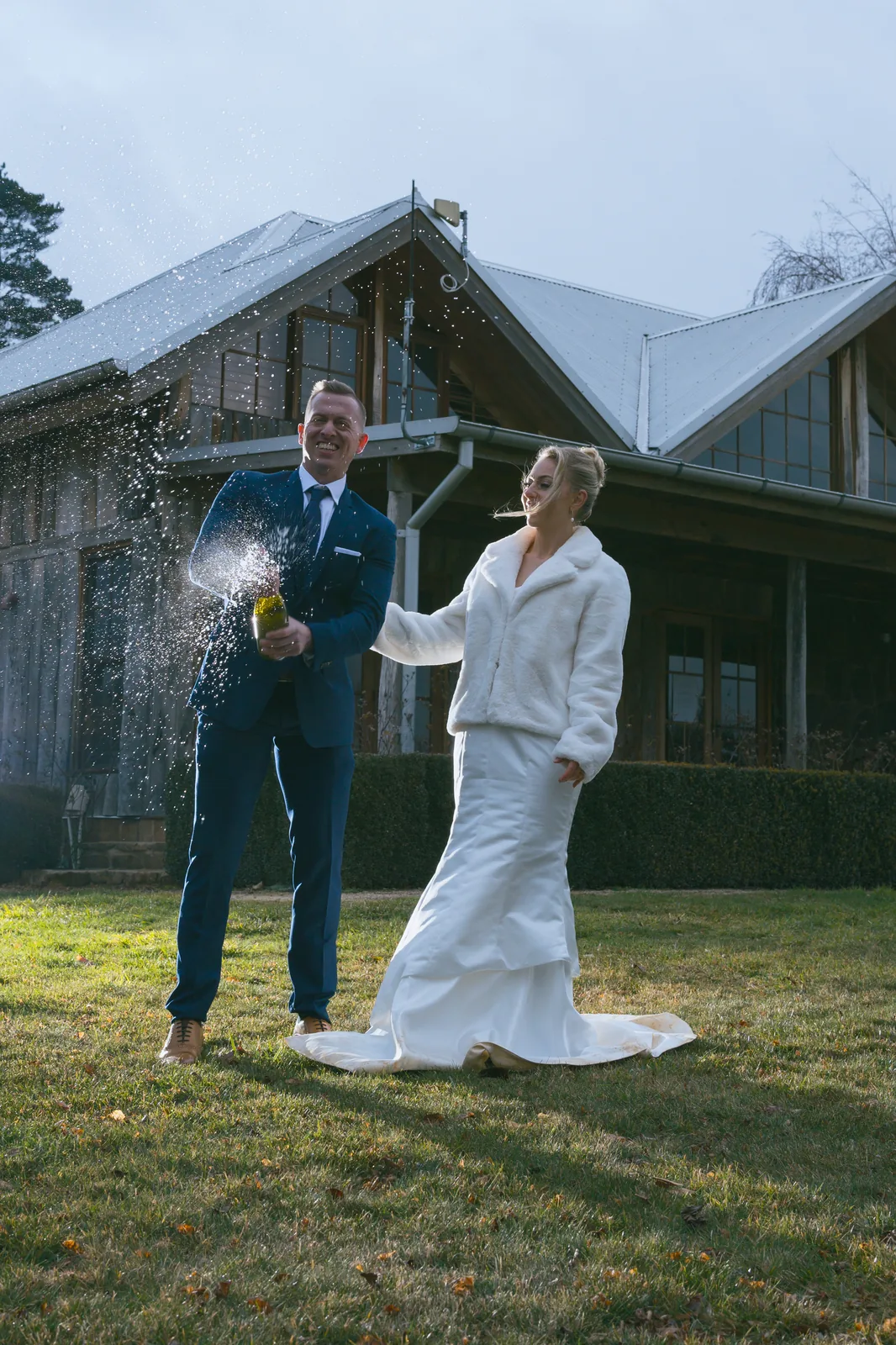 Couple popping champagne in celebration garden – Japanese documentary wedding photographer Sydney