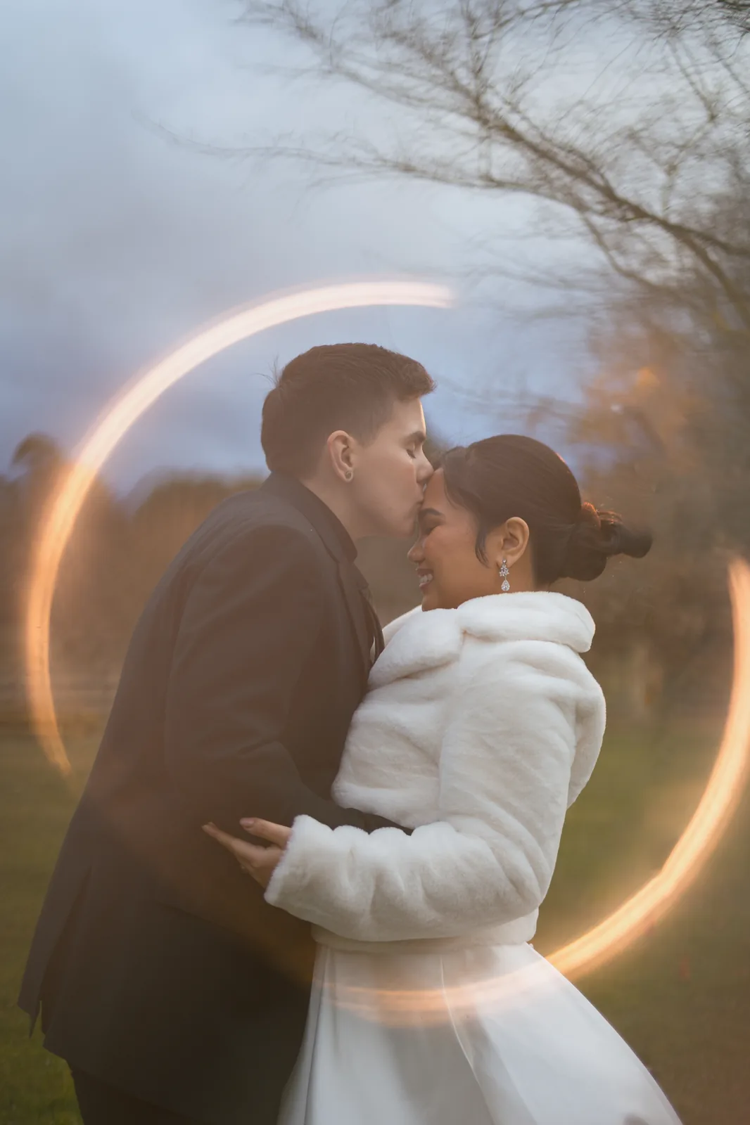 Couple kissing with light orb creative portrait – Japanese documentary wedding photographer Sydney
