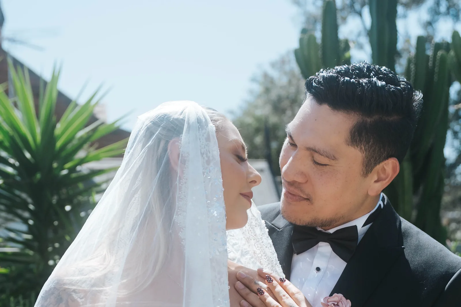 Bride and groom intimate veil embrace – Sydney documentary wedding photography
